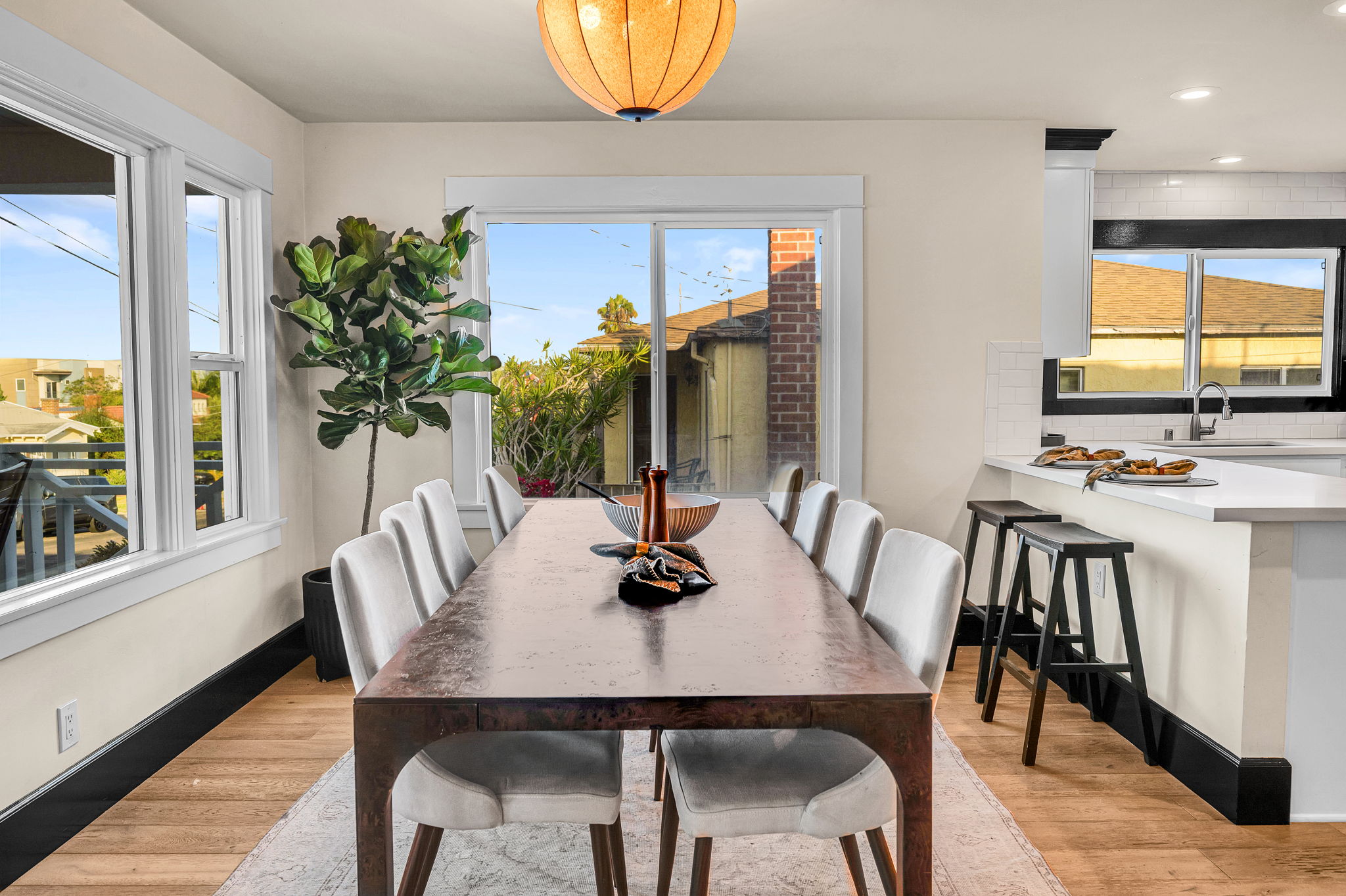 3235 Fenelon St. — Two fireplace living rooms, one open dining room.
