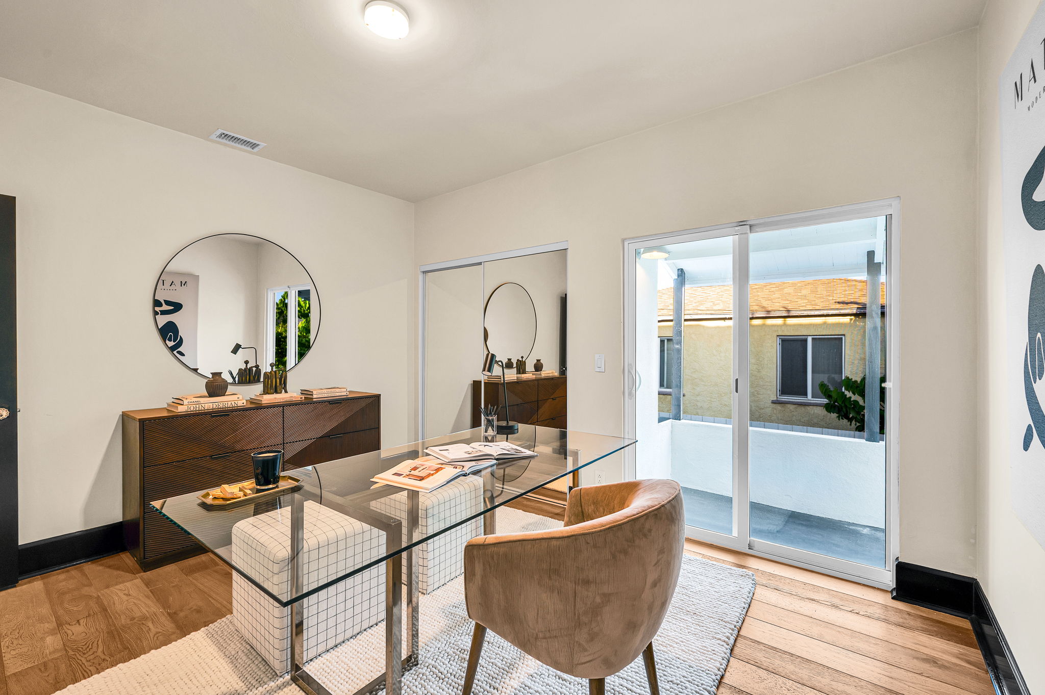 3235 Fenelon St. — Two fireplace living rooms, one open dining room.