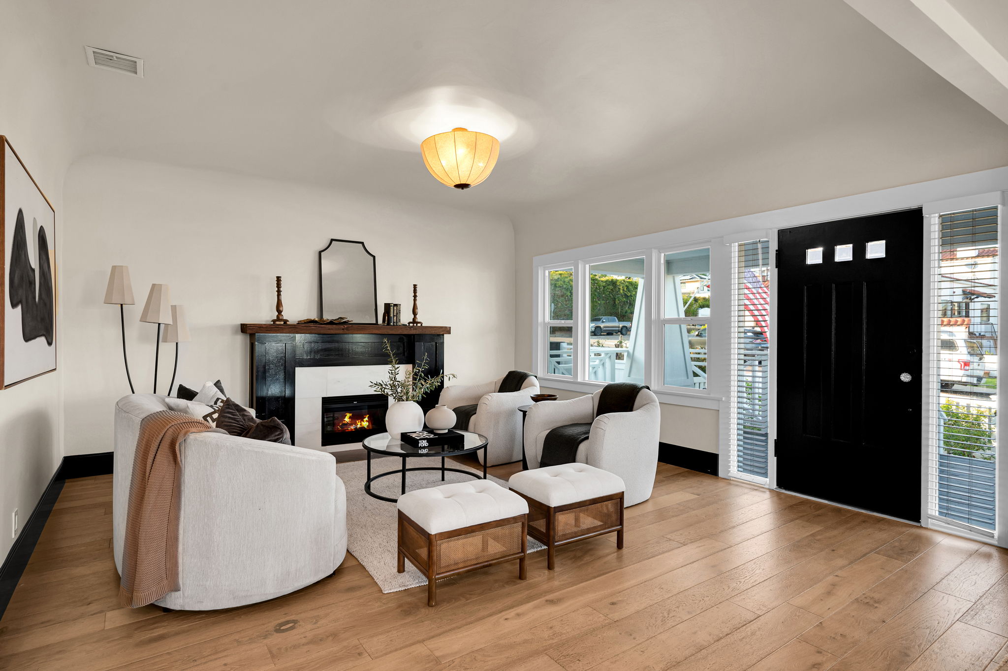 3235 Fenelon St. — Two fireplace living rooms, one open dining room.