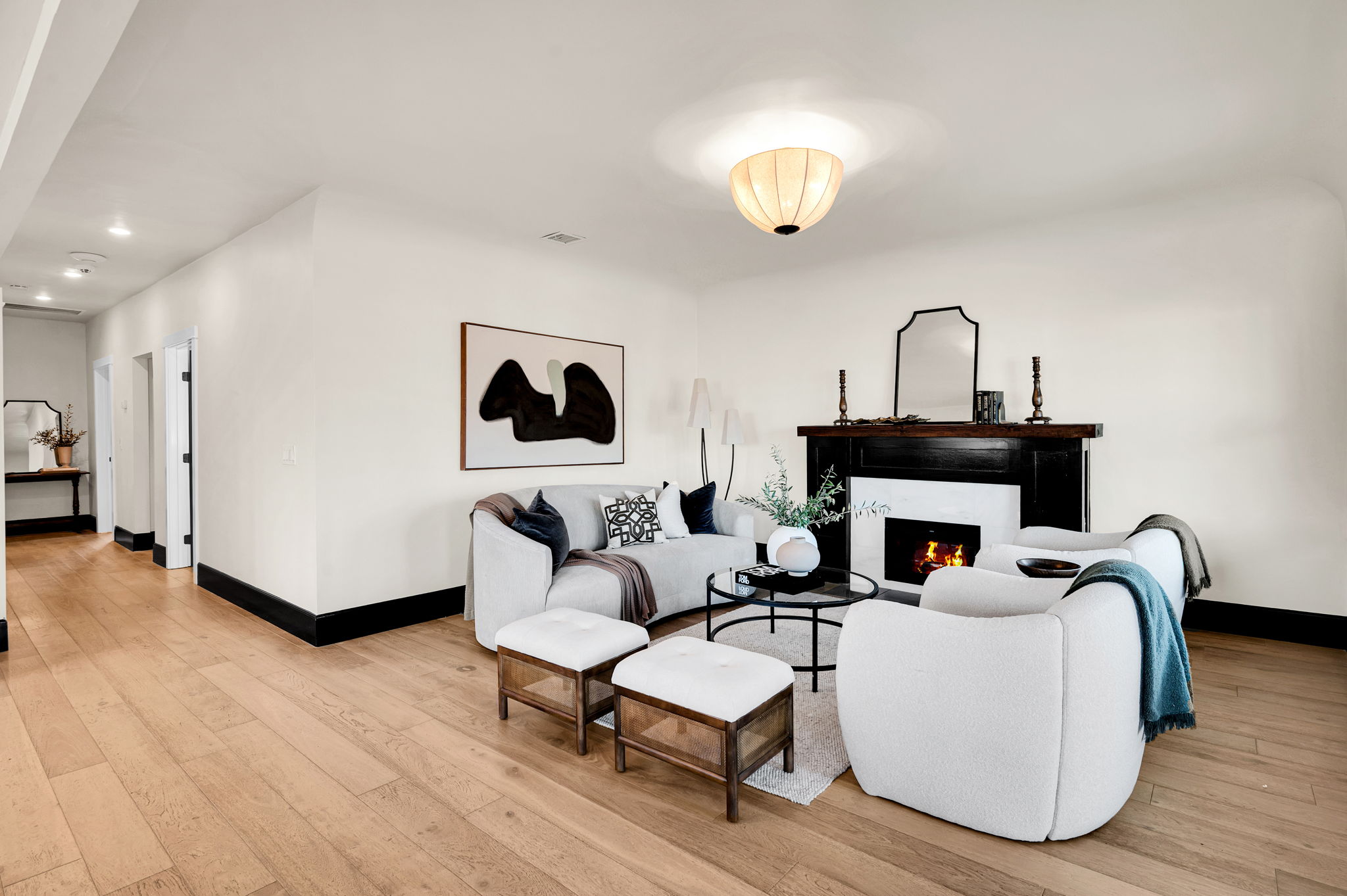 3235 Fenelon St. — Two fireplace living rooms, one open dining room.