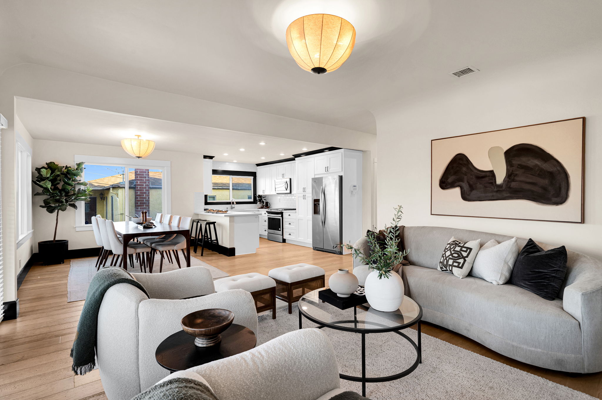 3235 Fenelon St. — Two fireplace living rooms, one open dining room.