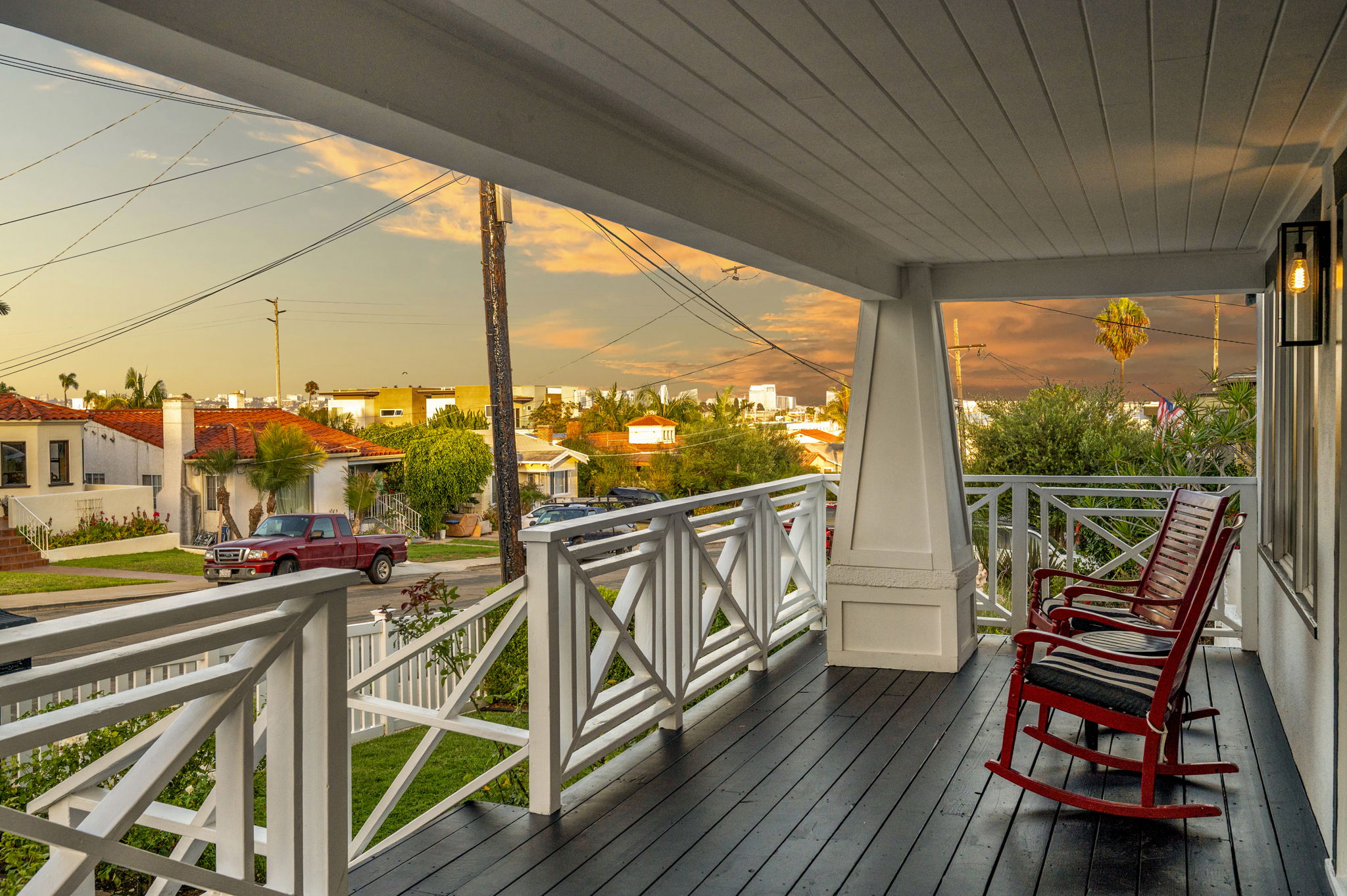 3235 Fenelon St. — A Craftsman behind a white picket fence.