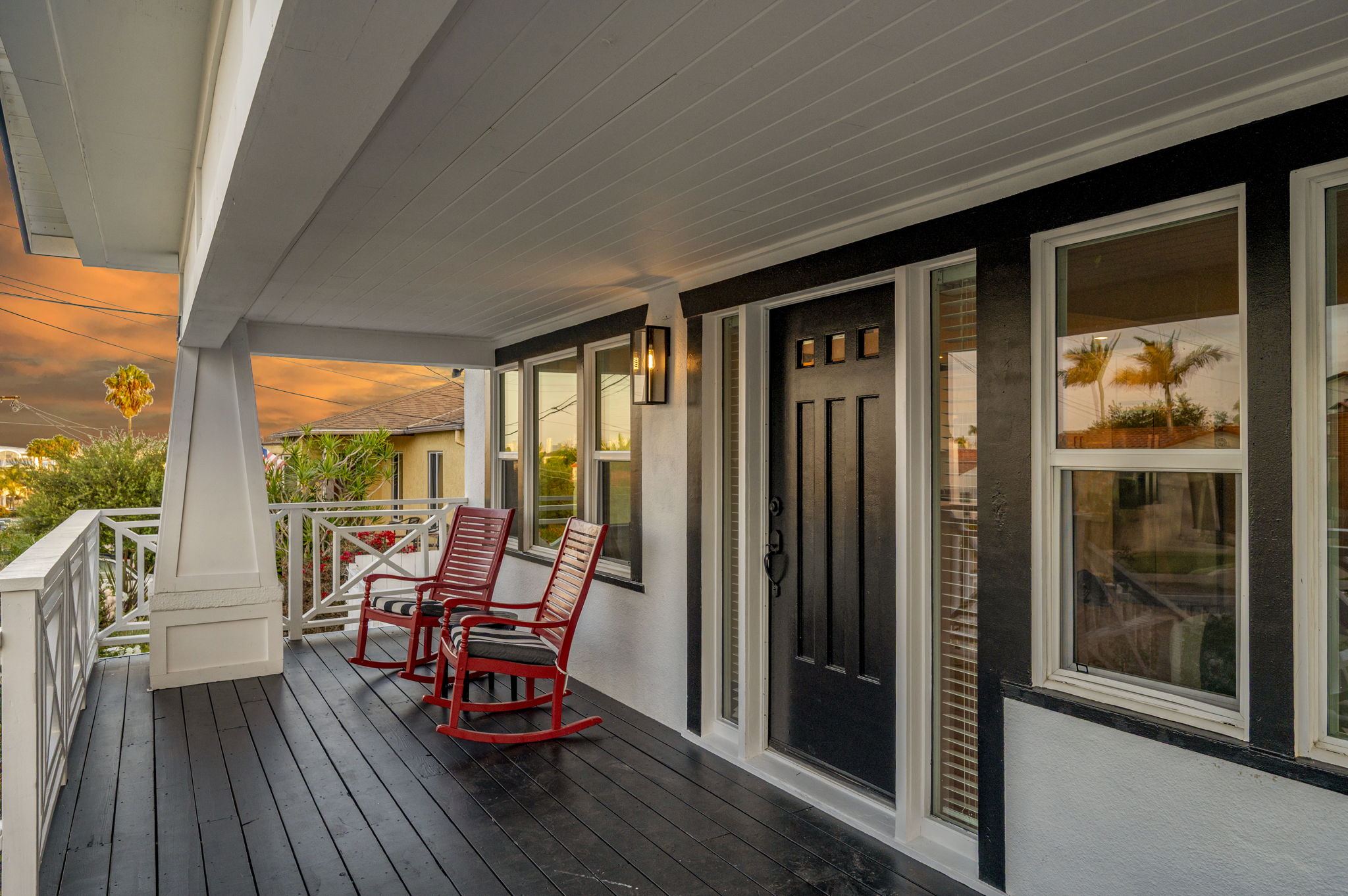 3235 Fenelon St. — A Craftsman behind a white picket fence.