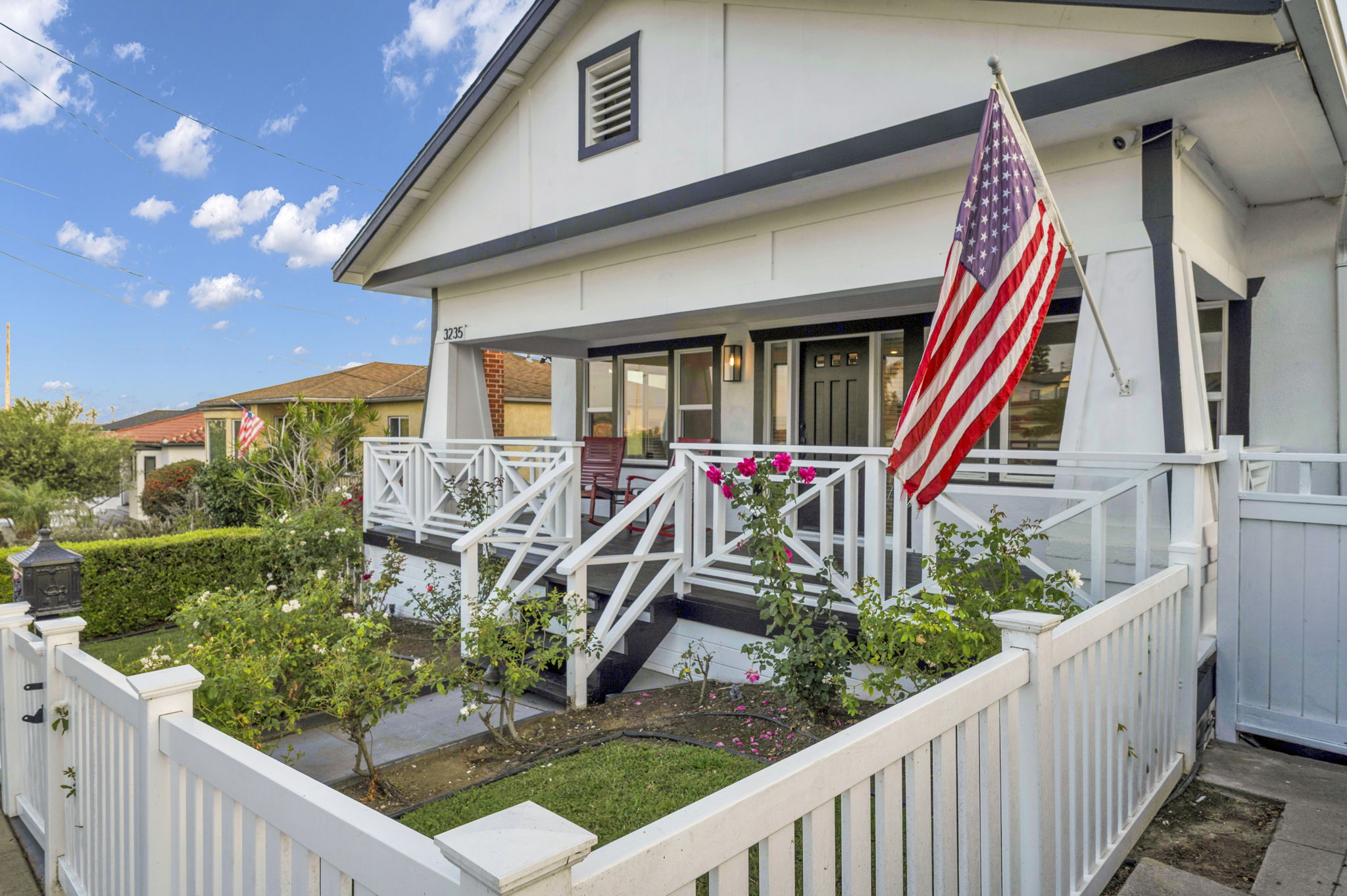 3235 Fenelon St. — The house at its best hour.