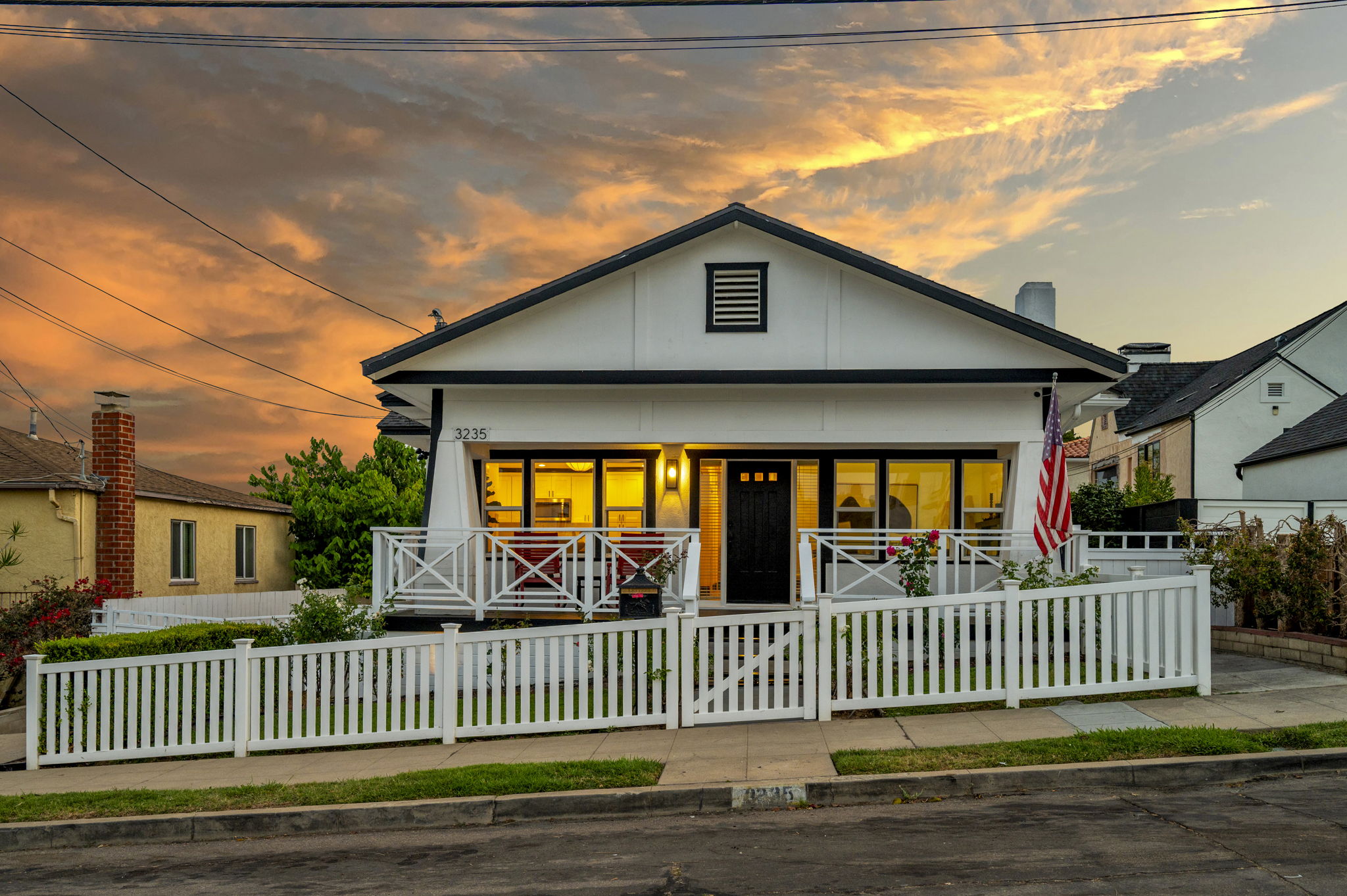 3235 Fenelon St. — The house at its best hour.