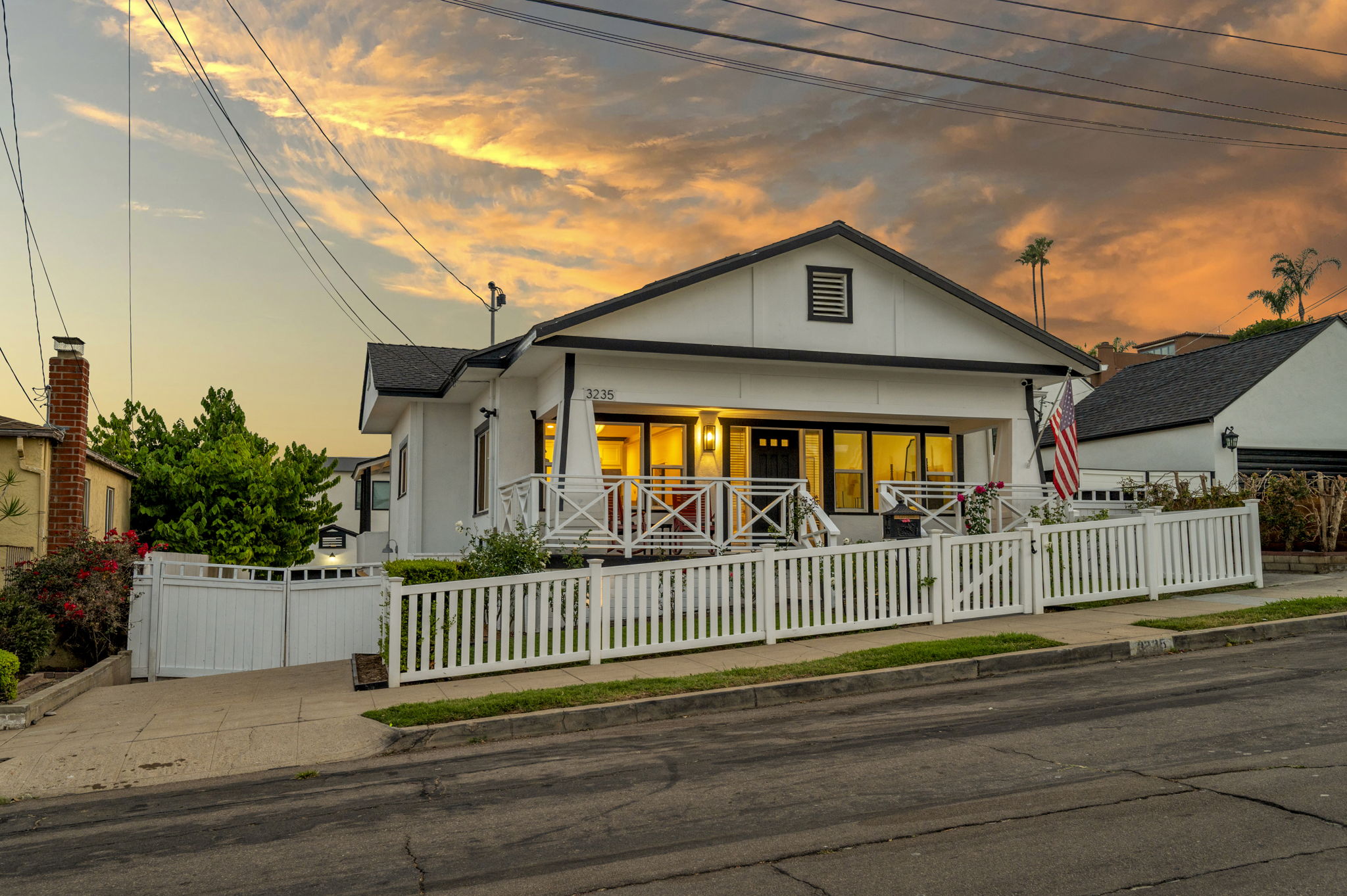 3235 Fenelon St. — The house at its best hour.