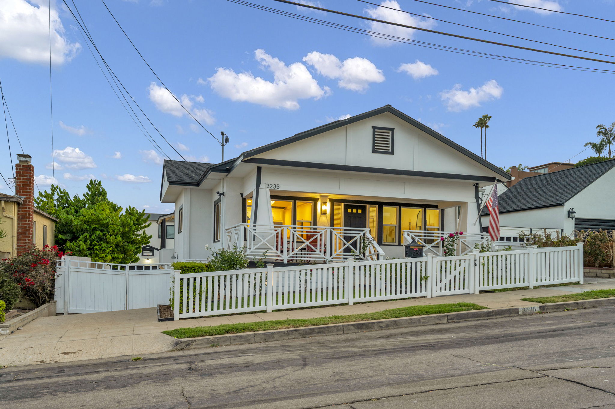 3235 Fenelon St. — The house at its best hour.