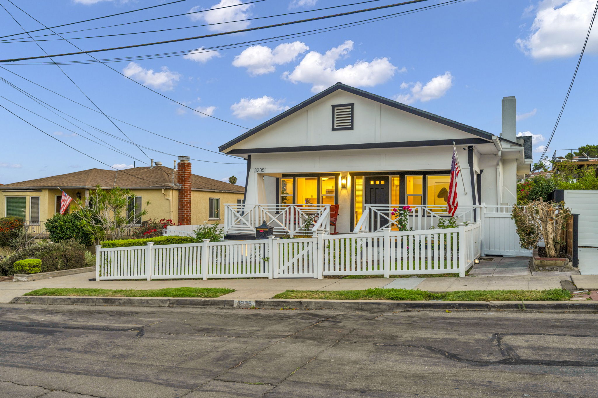 3235 Fenelon St. — The house at its best hour.