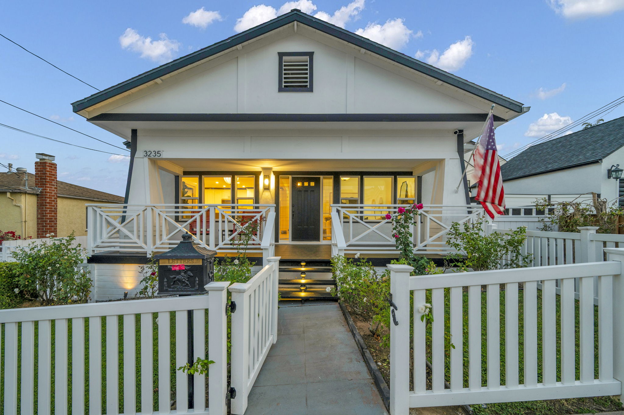 3235 Fenelon St. — The house at its best hour.