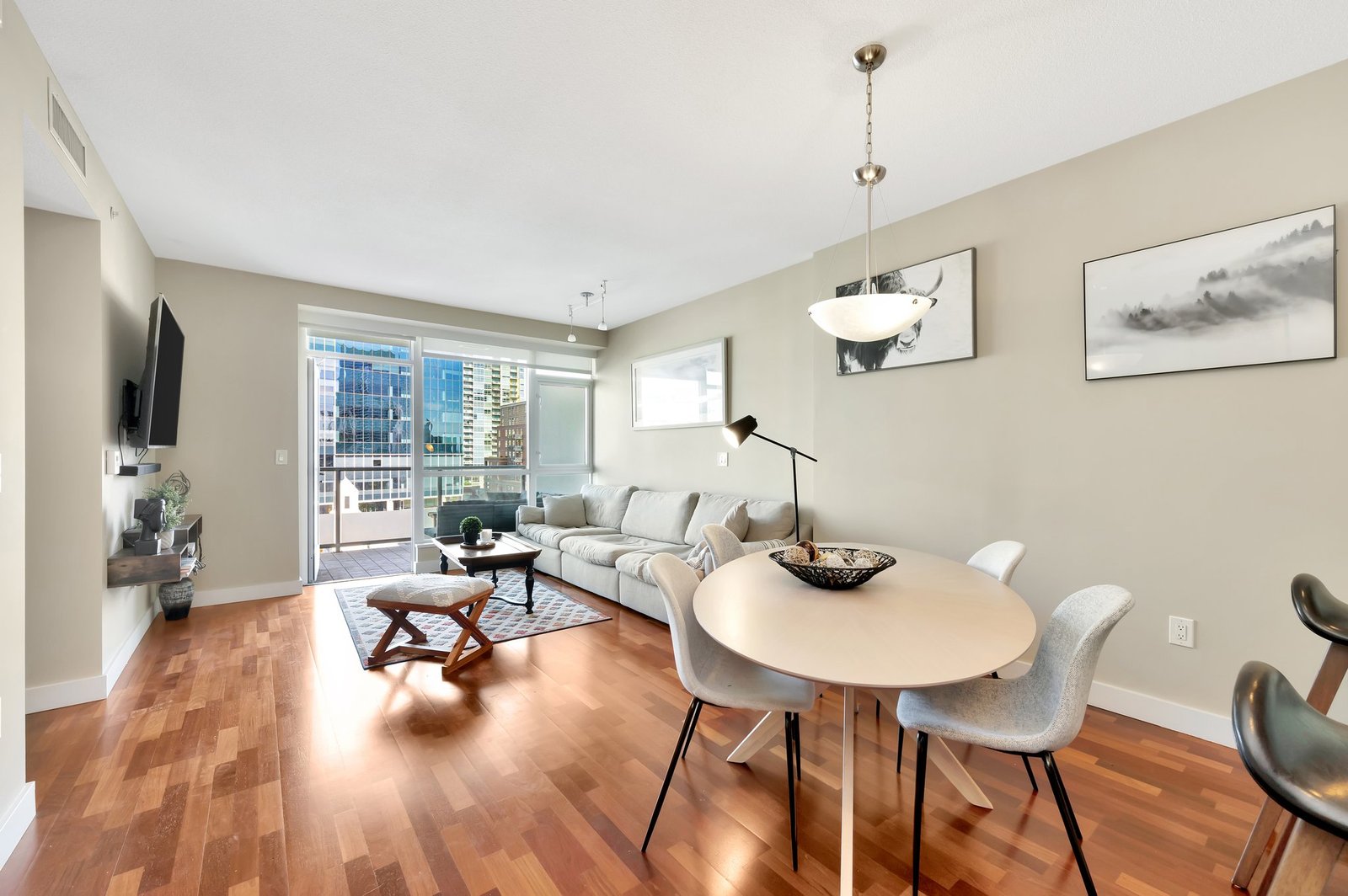 325 7th Ave., #808 — living room with city view