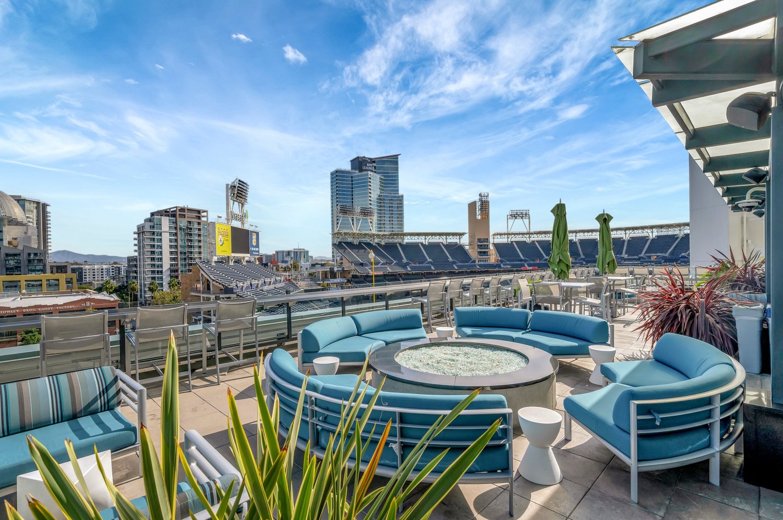 rooftop deck fire pit lounge with Petco Park view